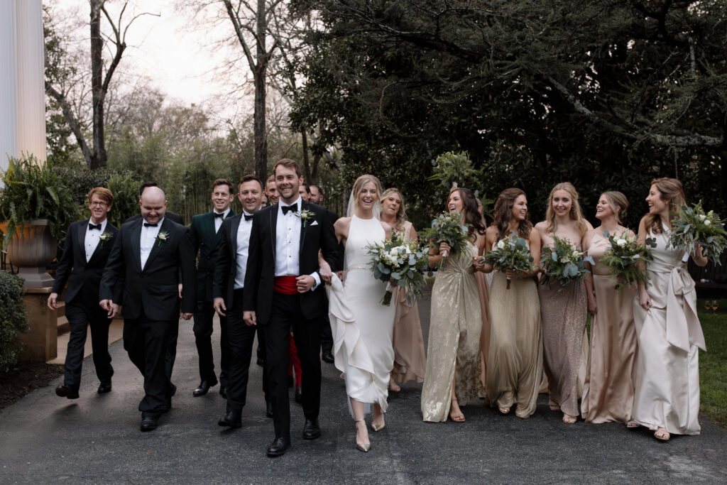 wedding party walking together during wedding photos