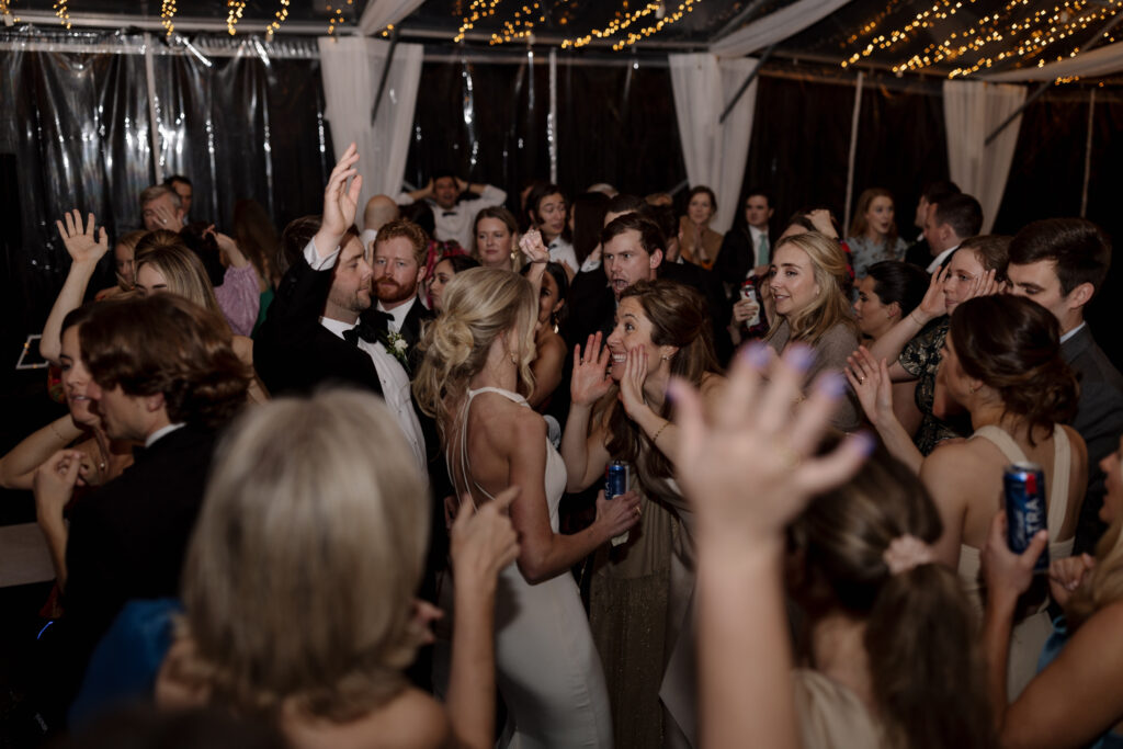 Bride dances with bridesmaids at her wedding in spartanburg sc