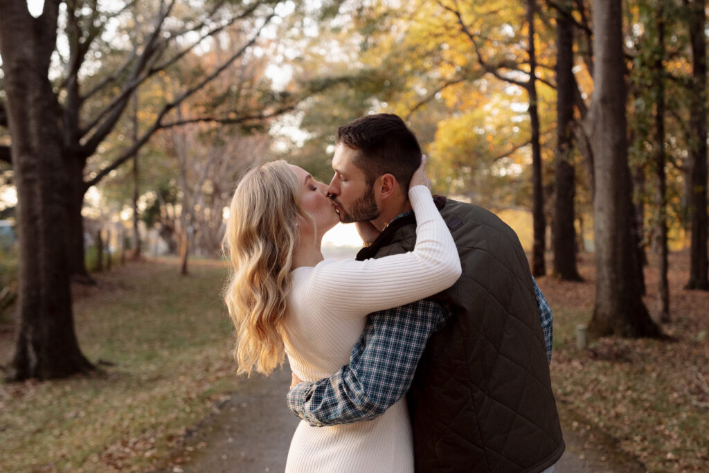 couple kissing during their engagement session in spartanburg sc