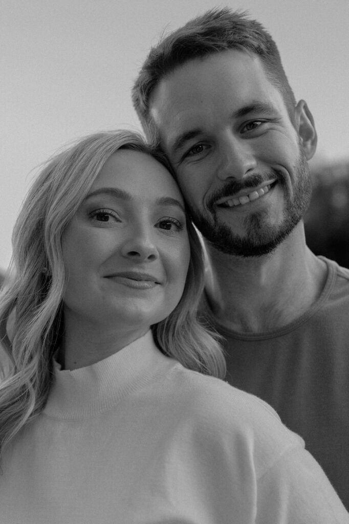 couple smiling during their engagement photos in spartanburg sc