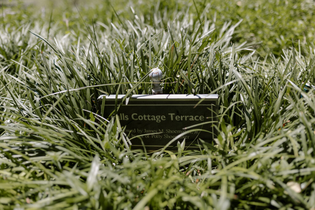 Falls Cottage Terrace plaque in the grass