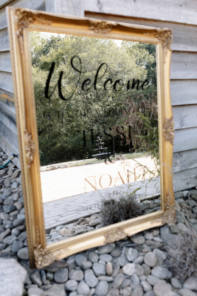 a mirror showing a different angle of a wedding venue