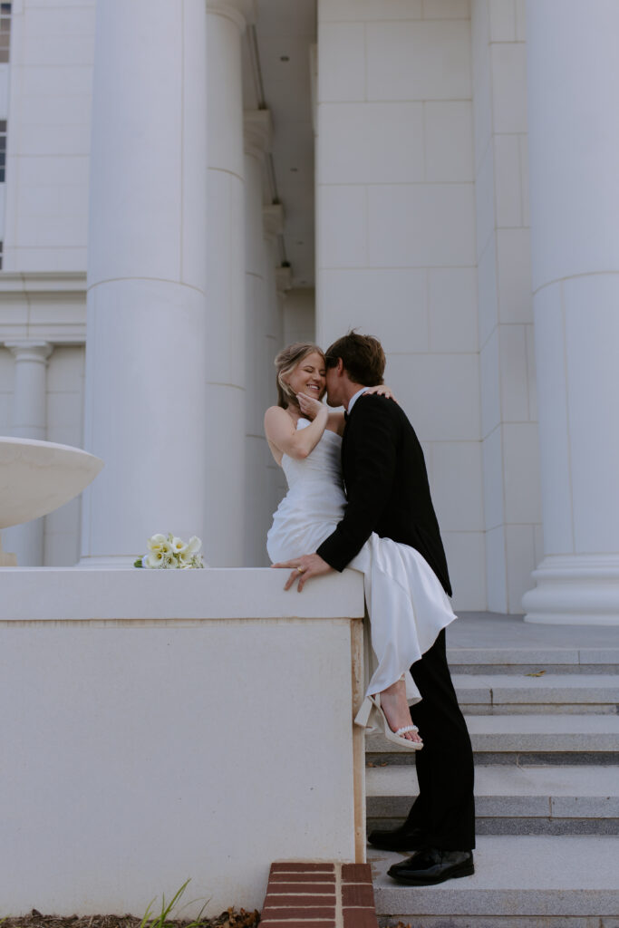 Bride and groom outside the spartanburg county courthouse after their elopement.
