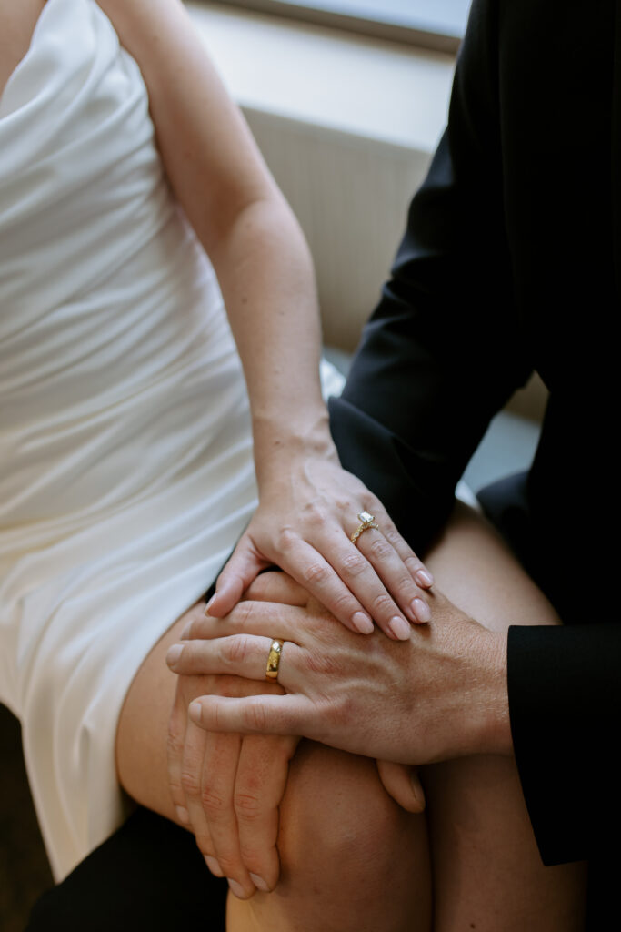 Bride and groom hands showing their rings after their elopement in Spartanburg, sc. 